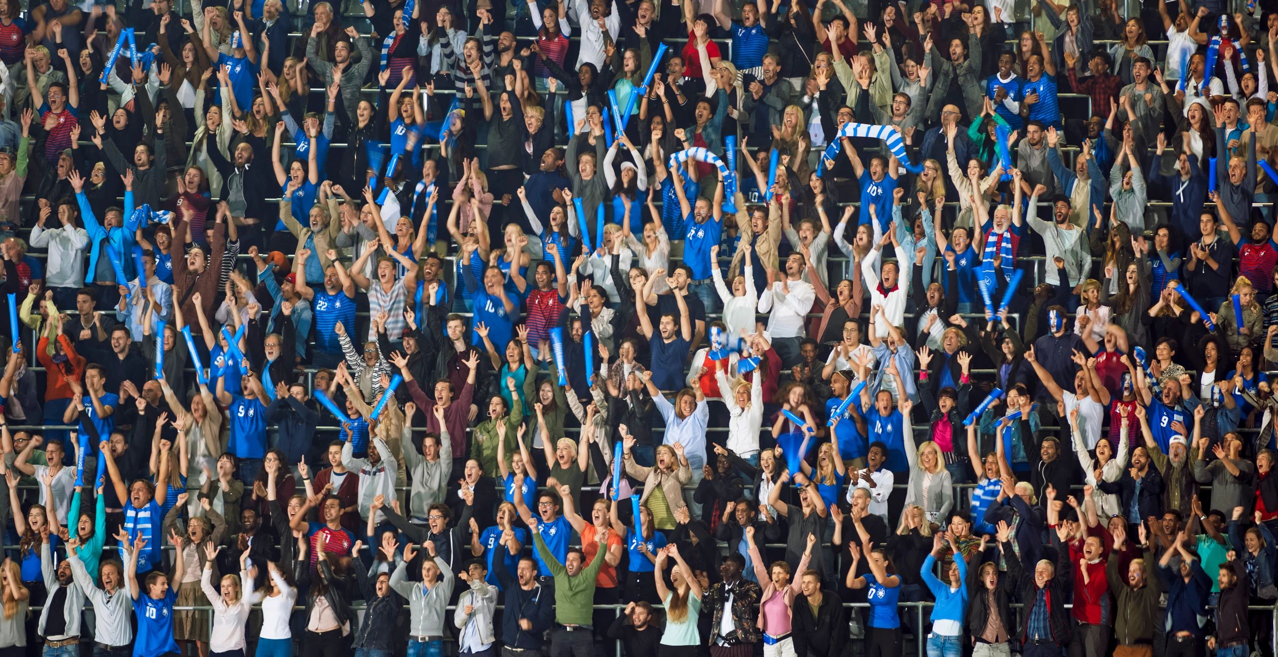 Motorsport fans cheering for Eli Stern at the race track
